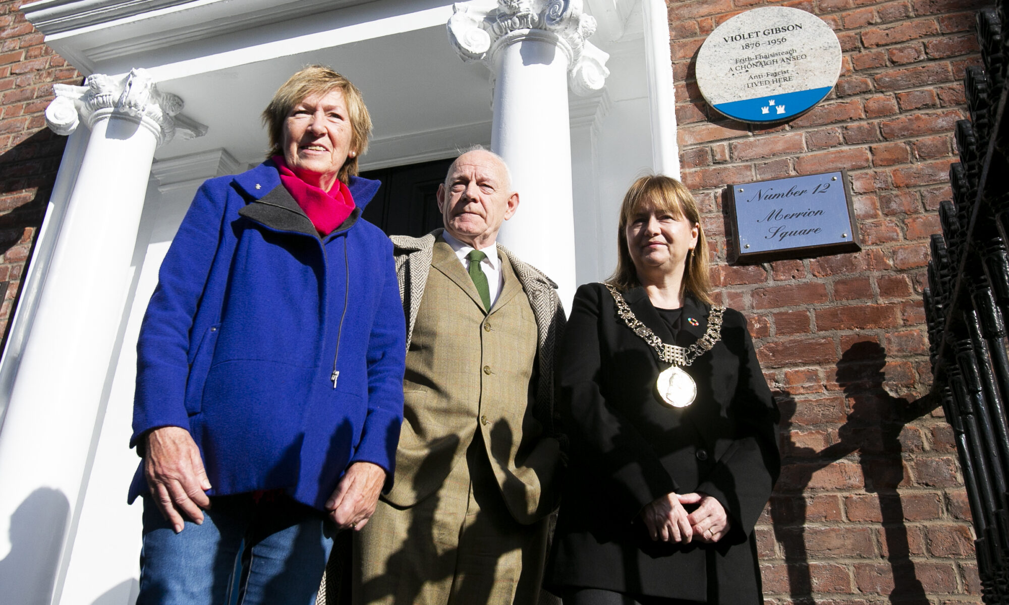 Photograph of Siobhán Lynam, Councillor Mannix Flynn, and Lord Mayor Caroline Conroy, at the unveiling of the plaque to Violet Gibson.